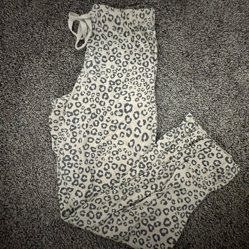 Cheetah print size, small pajama pants, lightly worn no holes